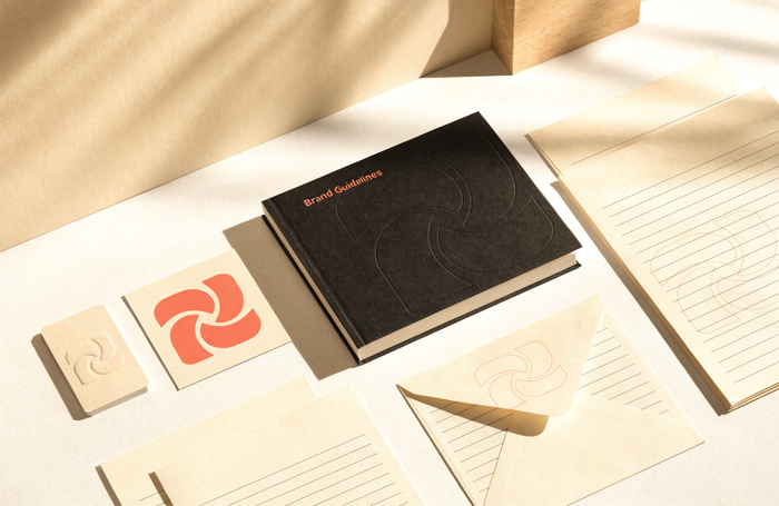 Premium brand identity system with a Brand Guidelines book, stationery and a coral logo, by Clayit. in Dubai