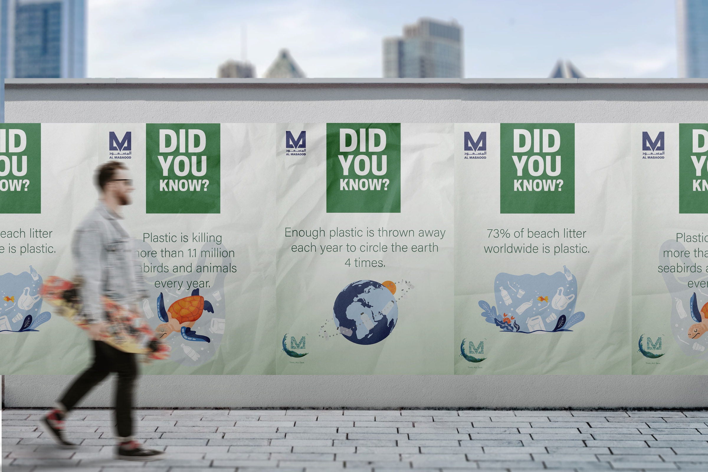 A person walking past the campaign posters on a corridor wall